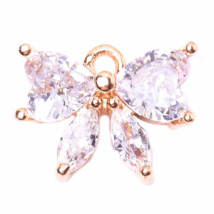 Chapa de Oro Dije Moño Cristal 10mm (1 pza)